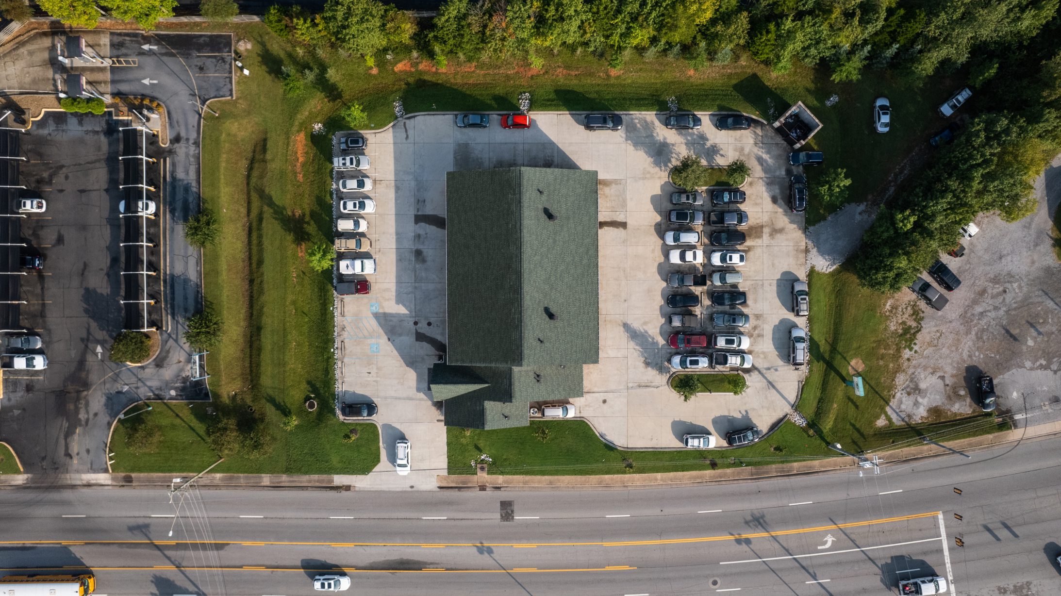 Overhead view of the site showing the green ditch system framing the parking lot