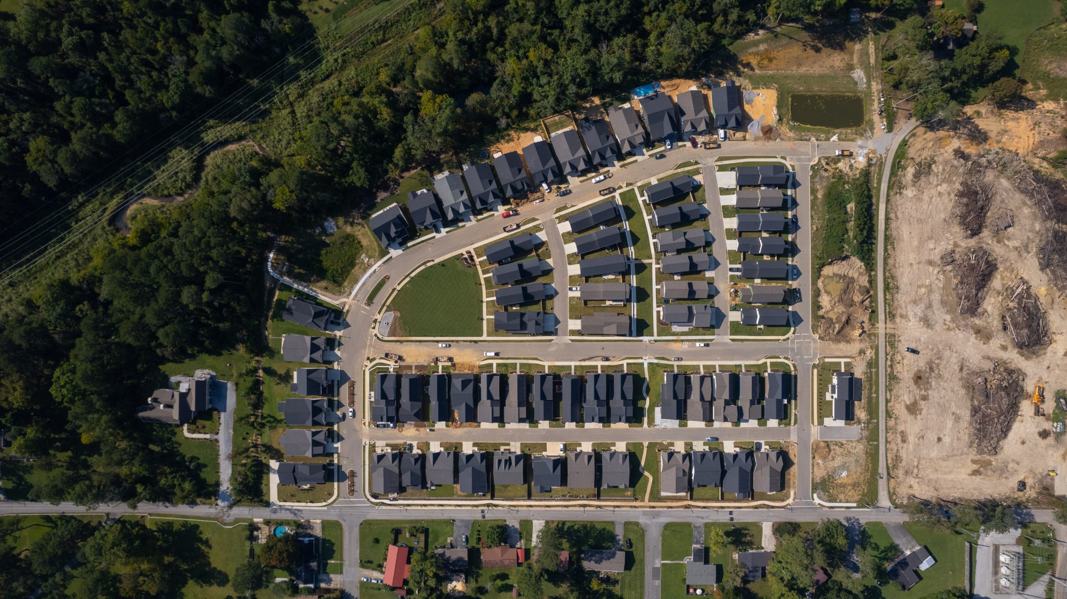 Aerial view of the Heritage Walk common green ringed by homes