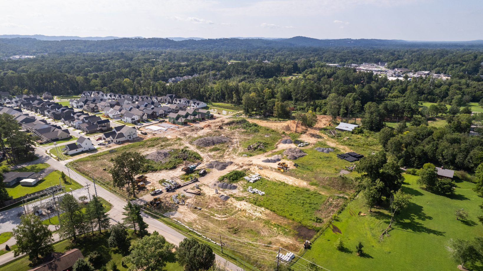 Wide aerial of the Heritage Walk site with East Brainerd beyond