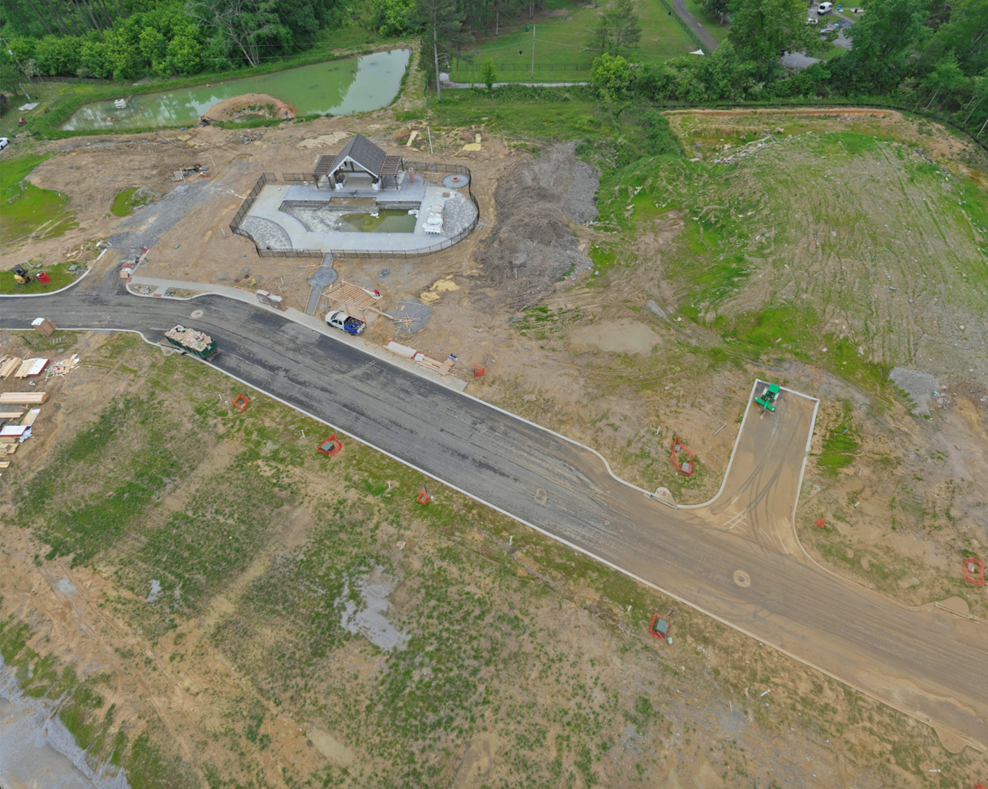 Aerial view of the pool, poolhouse and community area under construction