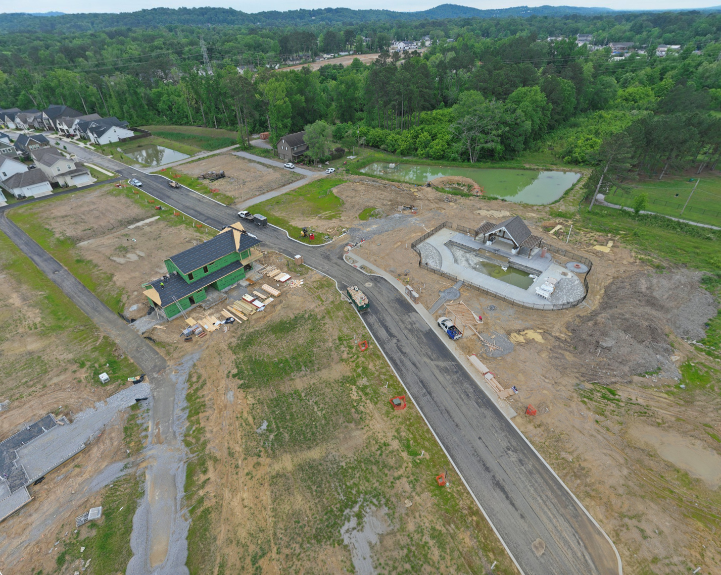 Aerial view of the community area, ponds and first homes under construction