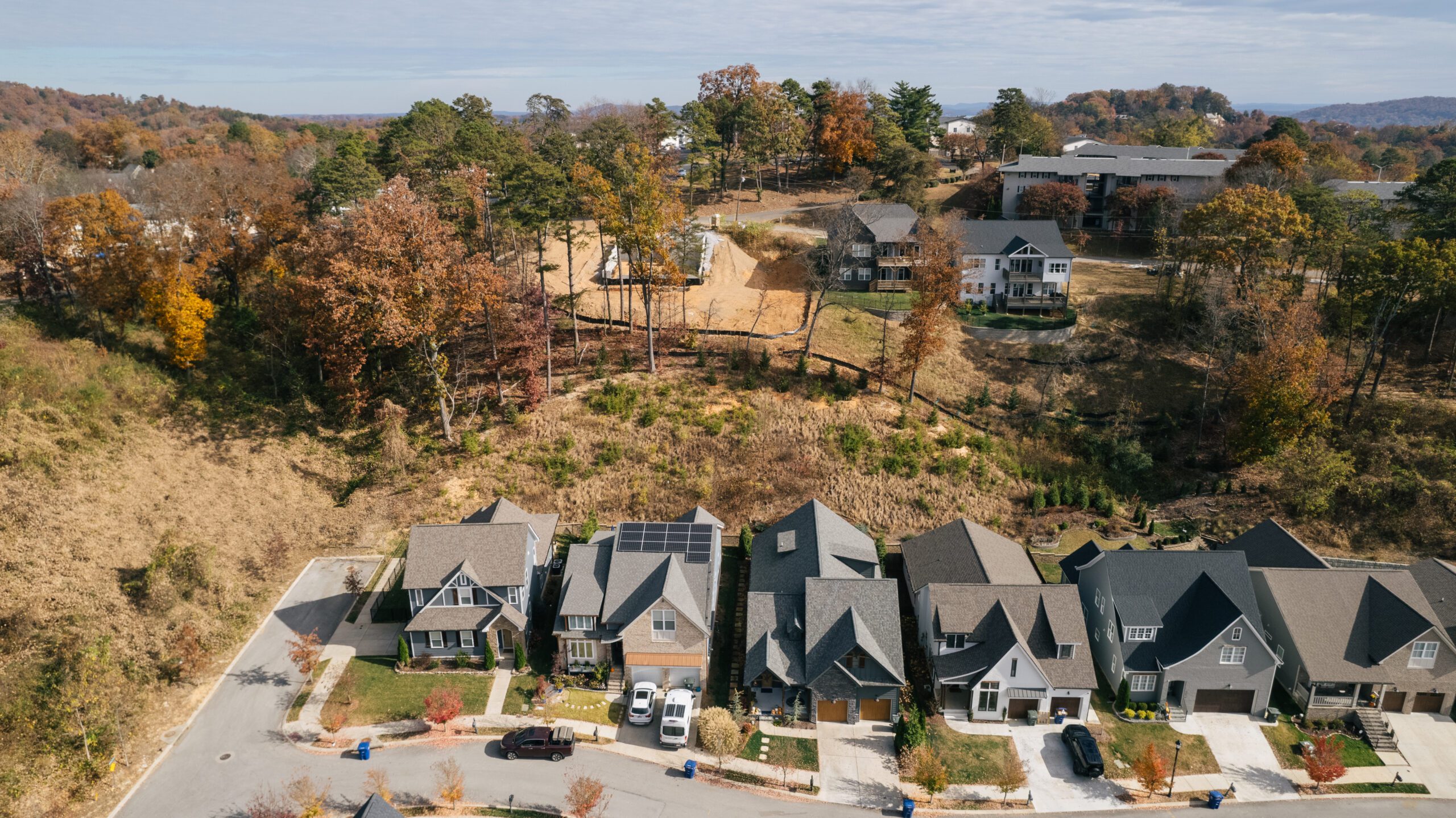 Aerial view of the graded hillside, retaining walls and rear lots