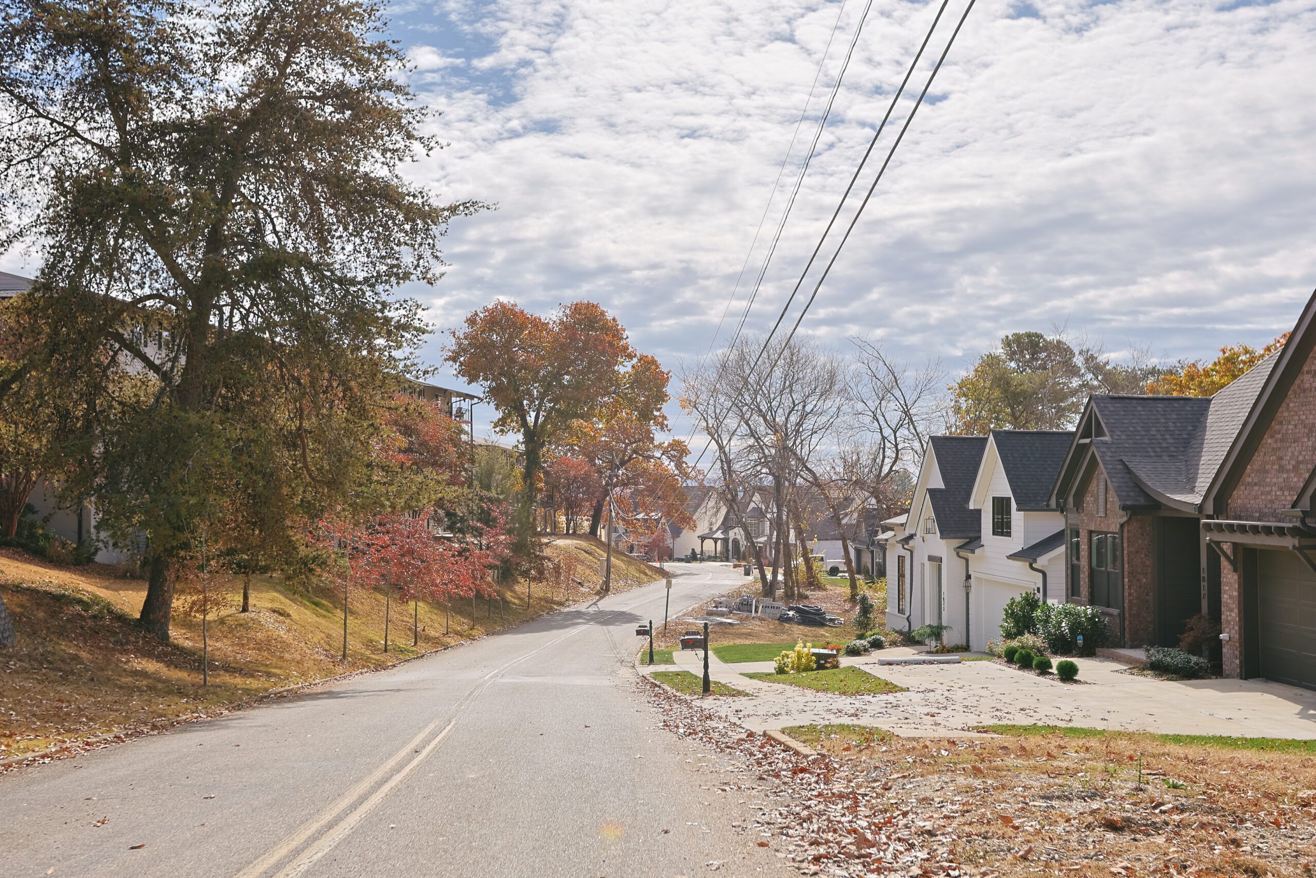 Homes under construction along the neighborhood road