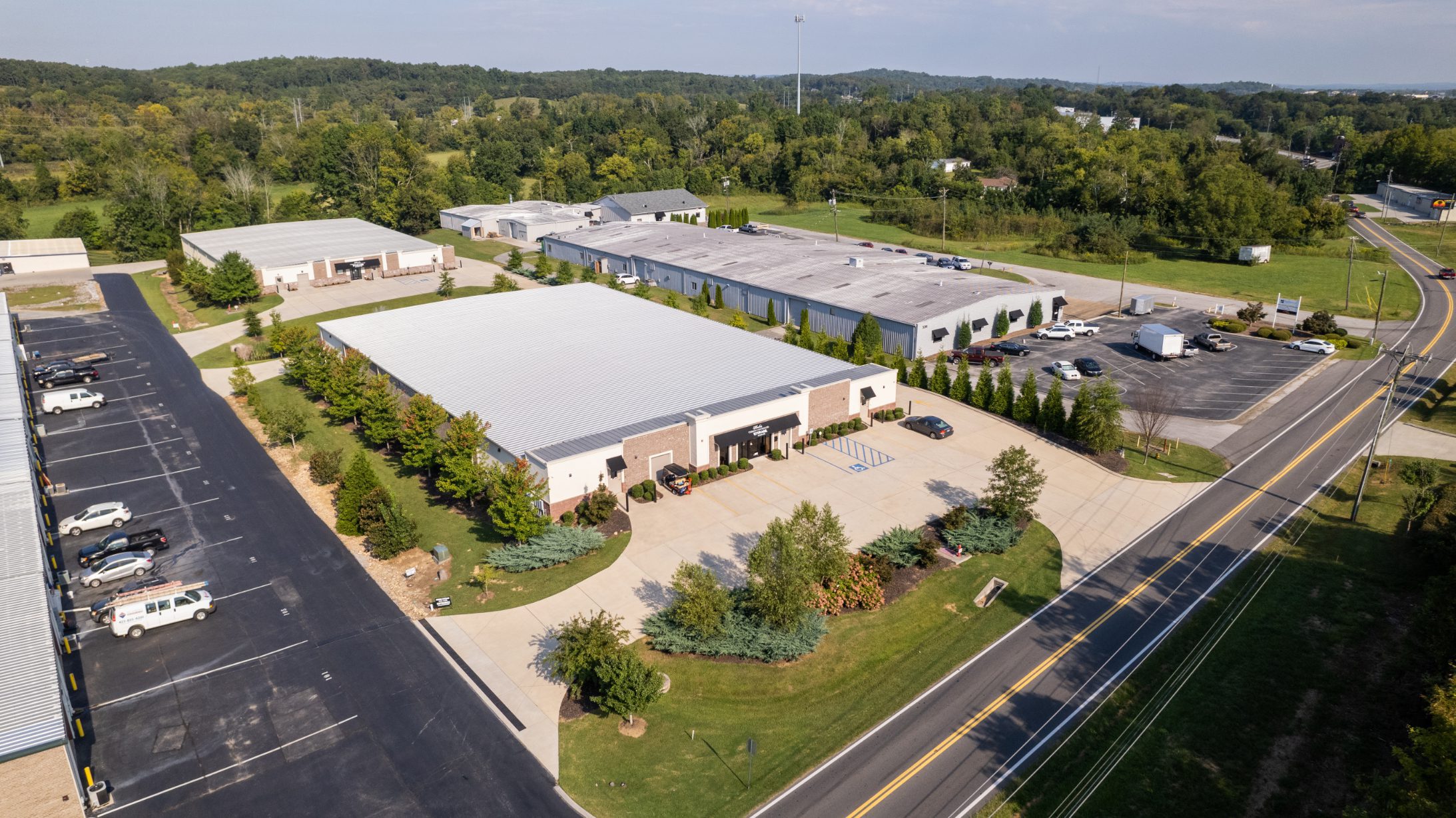 Aerial view of the Rhodes Storage building, drive and parking beside the road
